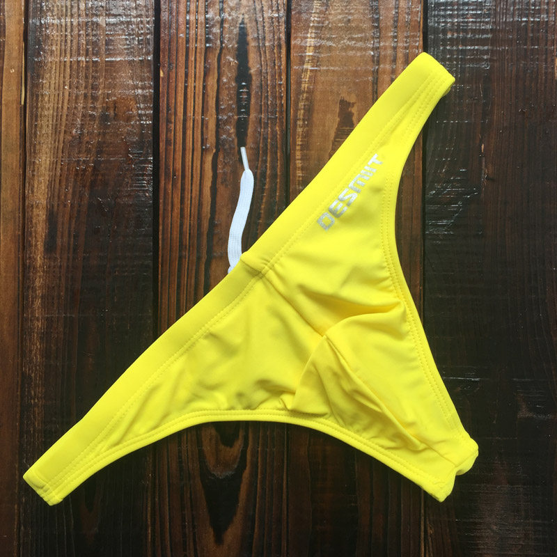 游泳裤头男 纯色露臀男士比基尼泳裤 超低腰性感丁字泳裤